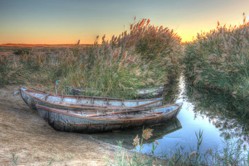 three boats on the river Bank, dawn, hdr