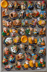 Fototapeta premium the showcase with Uzbek Souvenirs, magnets