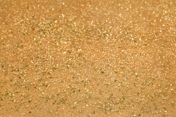Etoiles sur fond pailletté doré