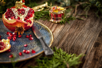 Pomegranate with Christmas decorations