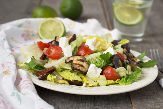 Salad with grilled eggplant, tomatoes and feta cheese