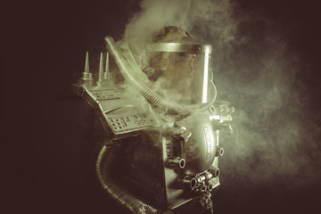 Futuristic, spaceman with plasma gun and helmet glass