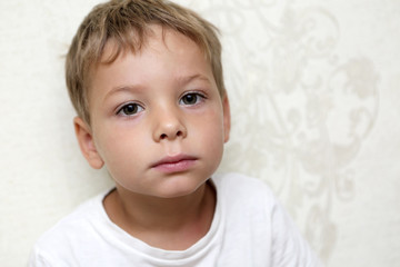 Fototapeta premium Portrait of a pensive kid