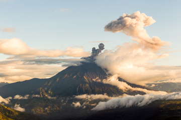 Witness the breathtaking Tungurahua volcano explosion at sunset in Ecuador,South America,an awe...