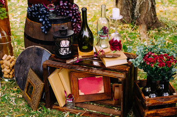 Beautiful decor with wine bottles, wooden boxes and other elemen