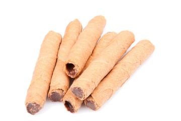 Delicious chocolate sticks showcased in a captivating closeup,set against a pristine white reflective background.