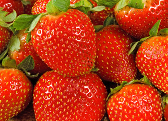 image of a ripe strawberry on a white background