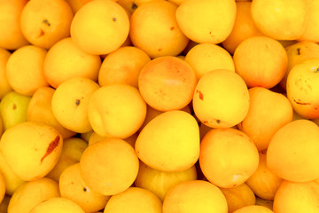 Delicious and juicy,these ripe yellow plums are bursting with flavor and ready to be enjoyed.
