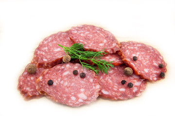 salami sausages on wooden board isolated