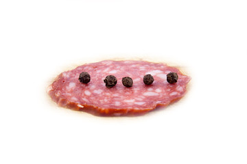 salami sausages on wooden board isolated