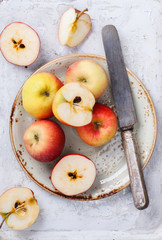 Apples on a plate, on a white background.selective focus.