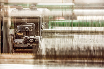 High quality yarn processing machine closeup showcasing its intricate parts in motion,ensuring optimal performance and efficiency.