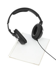 Headphones and notepad
