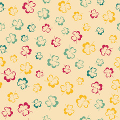 Abstract pattern with leaves on pale yellow background