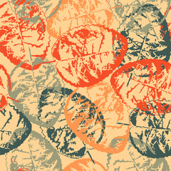 Grunge pattern with leaves on orange background