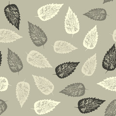Seamless pattern with leaves on light background