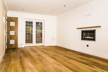 New build living room with oak doors and floors