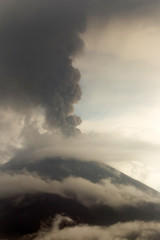 Tungurahua volcano eruption in May 2011 released a large quantity of ash,darkening the sky with a dramatic vertical composition.