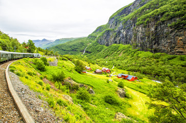Kjosfossen waterfall in Flam, Norway. Kjosfossen waterfall is one of the most visited tourist...