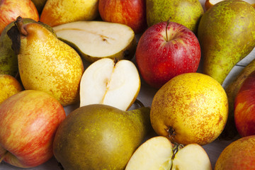 apples and pears whole and halved shot close-up