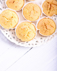 Cornbread muffins on white wooden table