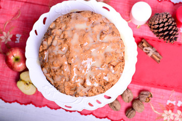 Fresh Christmas cake with apples and walnuts, closeup