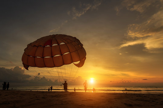 Man Is Preparing Para Sailing At The Beach In Thailand