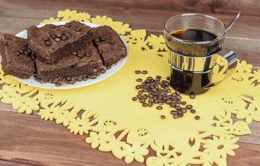 On a wooden table on yellow napkin