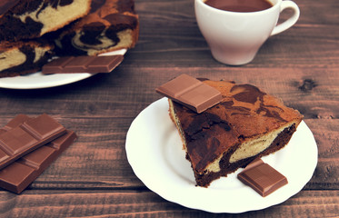Marble cake in white plate cut into pieces a la carte