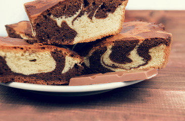 Marble cake in white plate cut into pieces a la carte