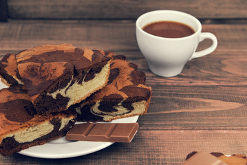 Marble cake in white plate cut into pieces a la carte