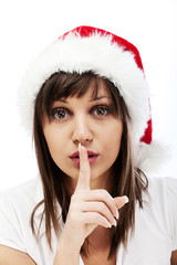 Naklejka premium Young woman with santa hat