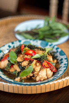 Thai spicy food basil chicken.