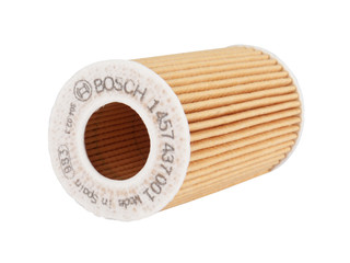 Oil filter, air filter, fuel filter on a white background