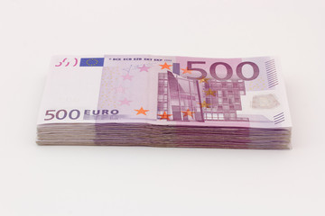 Money - Isolated stack of Five hundred (500) euro bills banknotes with white background