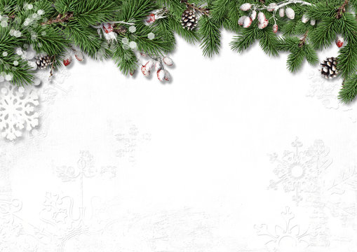 Christmas white background with decorations, holly and branches