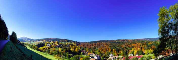 Beautiful wide panoramic view of autumn hills