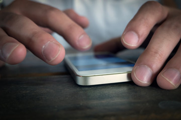 businessman using a mobile phone with texting message