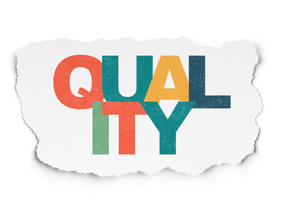 Advertising concept: Quality on Torn Paper background