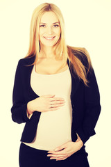 Pregnant woman in business suit.