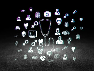 Medicine concept: Stethoscope in grunge dark room