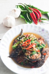 Thai Food Spicy Cat Fish with vegetables (Pla Duk Pad Ped)