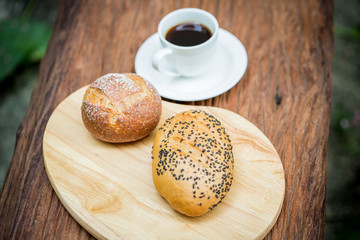 Hot coffee with bake bread for breakfast