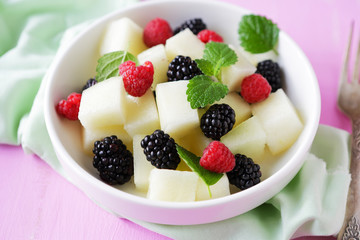 salad with melon and blackberries