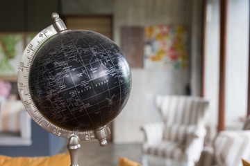 model of black world decorated in living room with furniture bac