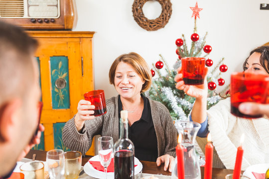 Family Toasting for Christmas Dinner at Home