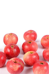 The red fresh apples isolated on white background
