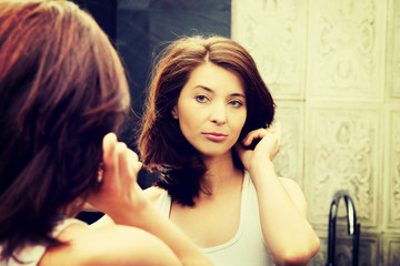 Fototapeta premium Woman take care of her beauty.
