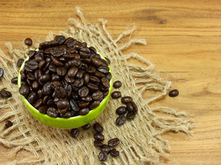 coffee beans on wooden background still life