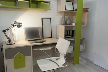 Interior of student (teenager) room in the evening 